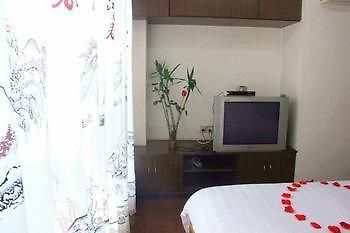 Yangguang Xingzuo Apartment Hotel Tsjoengking Buitenkant foto