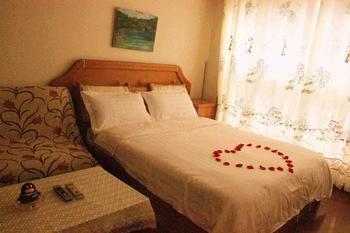 Yangguang Xingzuo Apartment Hotel Tsjoengking Buitenkant foto