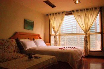 Yangguang Xingzuo Apartment Hotel Tsjoengking Buitenkant foto