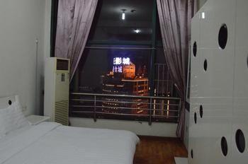 Yangguang Xingzuo Apartment Hotel Tsjoengking Buitenkant foto