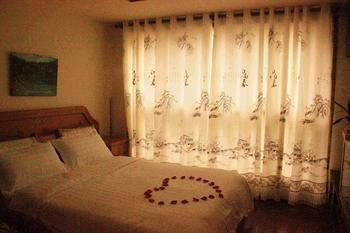 Yangguang Xingzuo Apartment Hotel Tsjoengking Buitenkant foto